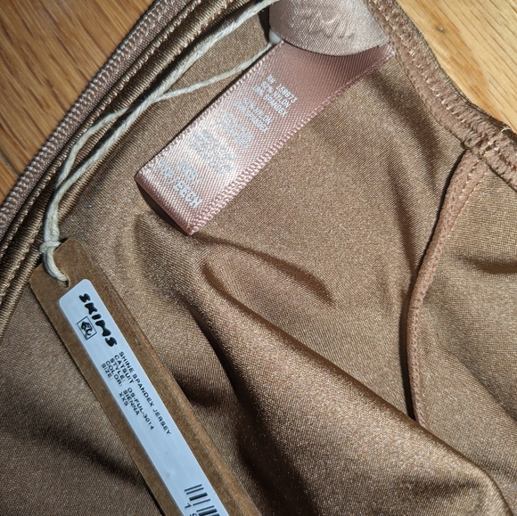 1. NWT SKIMS SHINE SPANDEX JERSEY CATSUIT IN SIENNA - Picture 7 of 7